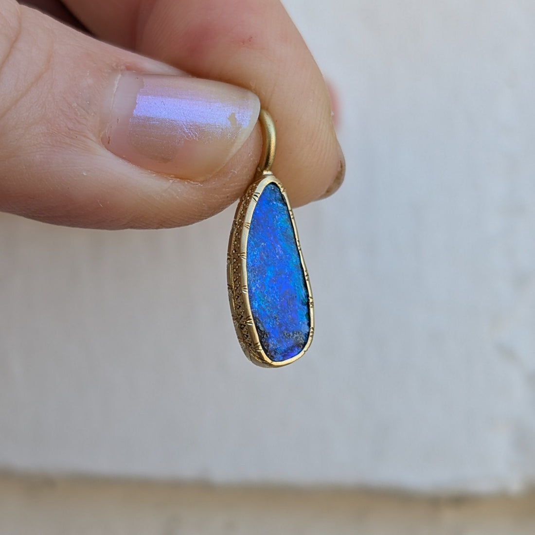 Engraved Boulder Opal Bezel Set Pendant