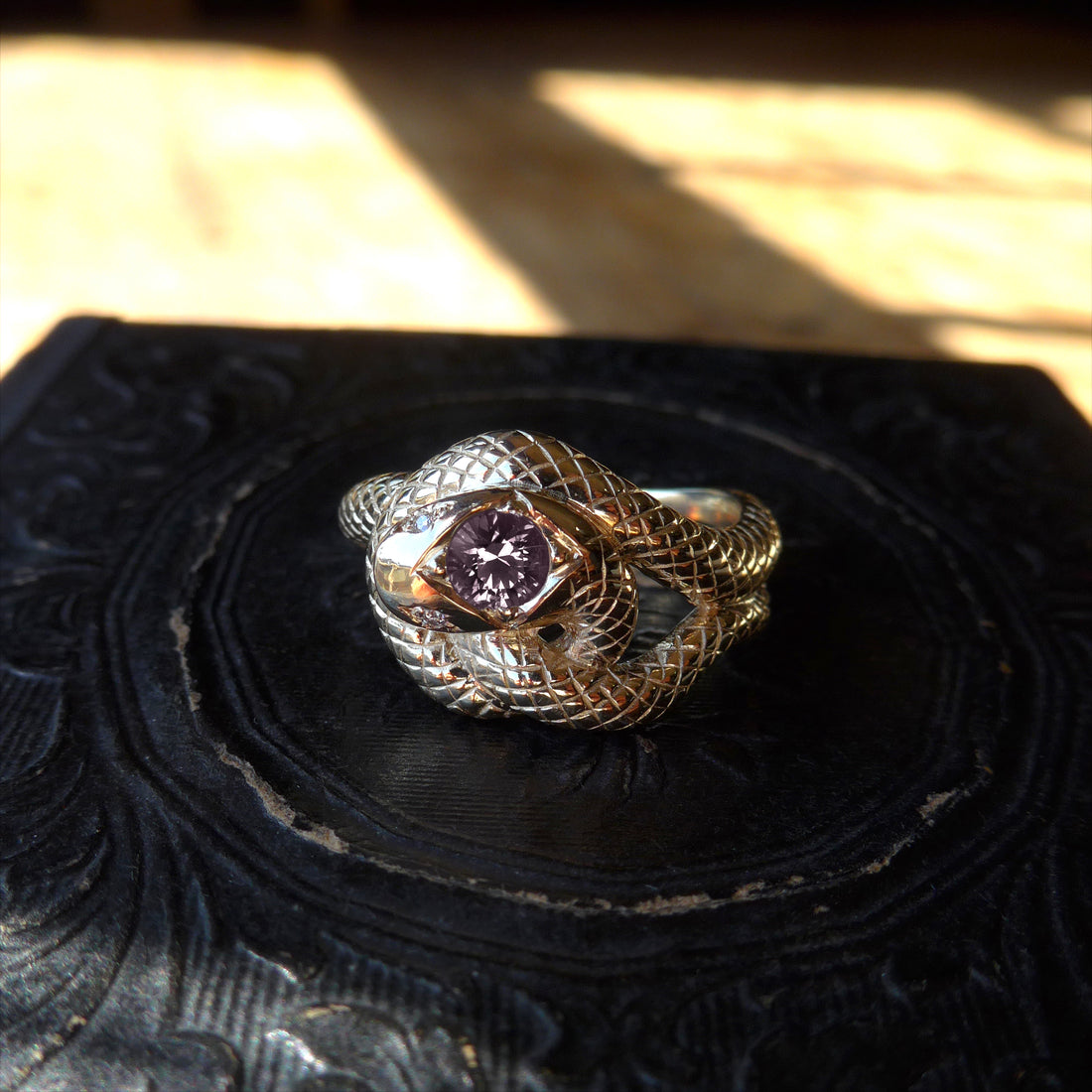 14k Snake Knot Ring with purple Montana sapphire