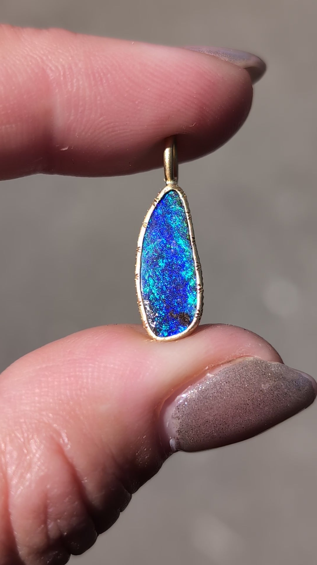 Engraved Boulder Opal Bezel Set Pendant
