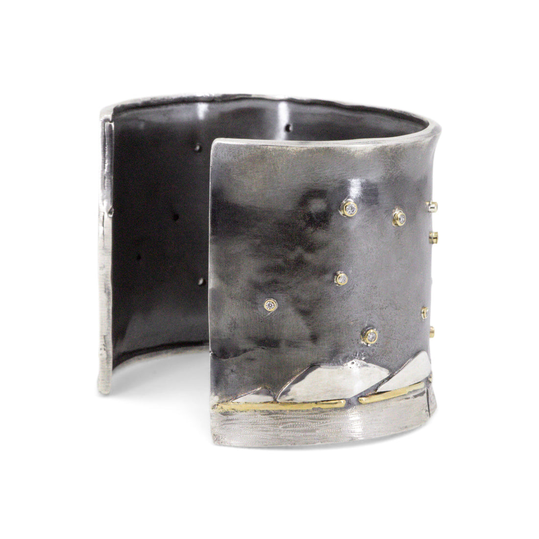 Wide mixed metal statement cuff with desert landscape motif and diamond accents by Erin Cuff Jewelry.