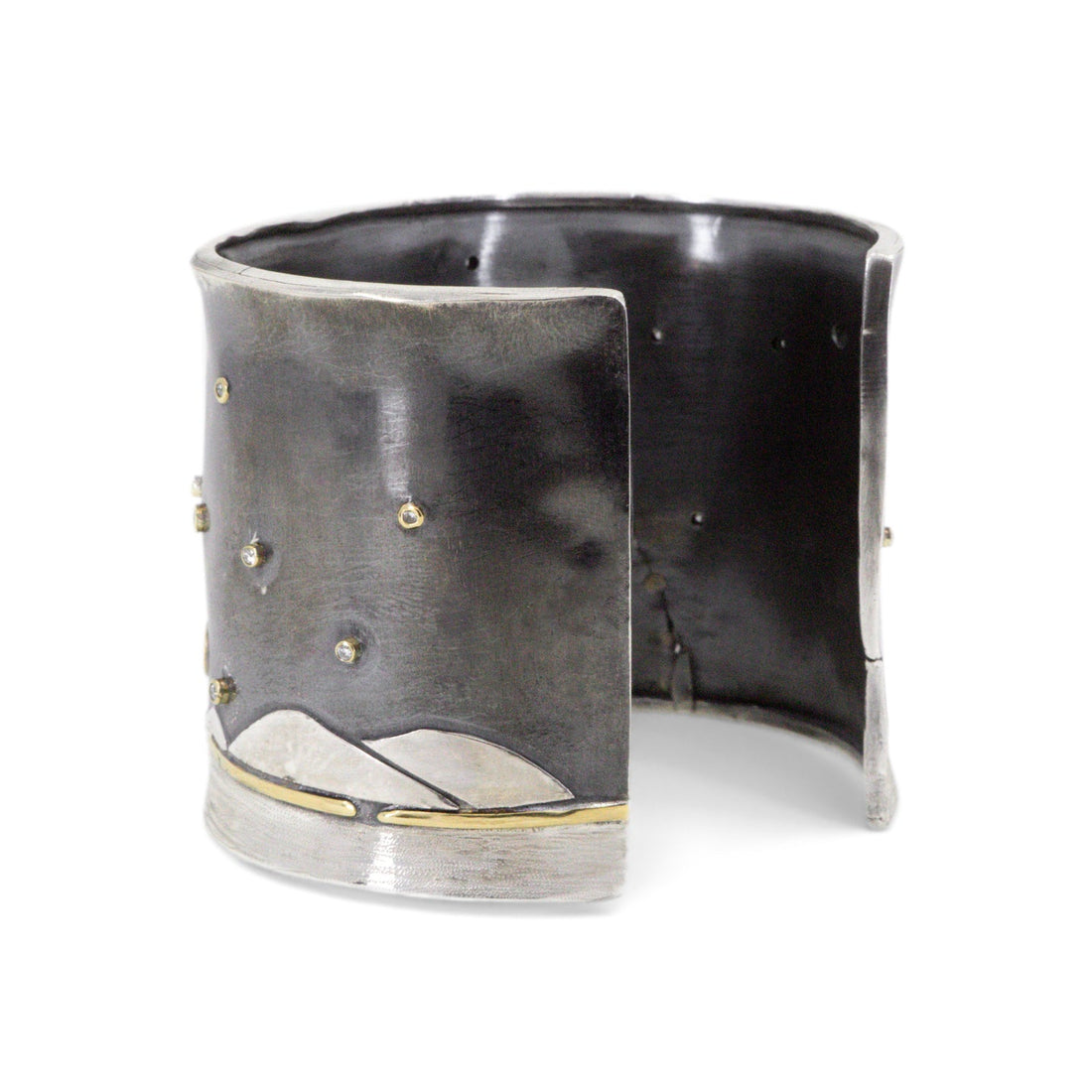 Wide mixed metal statement cuff with desert landscape motif and diamond accents by Erin Cuff Jewelry.