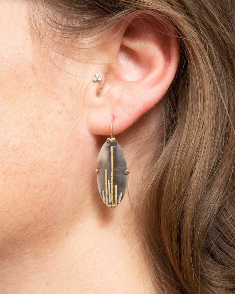 Mixed metal drop earrings with cactus motif by Erin Cuff Jewelry.