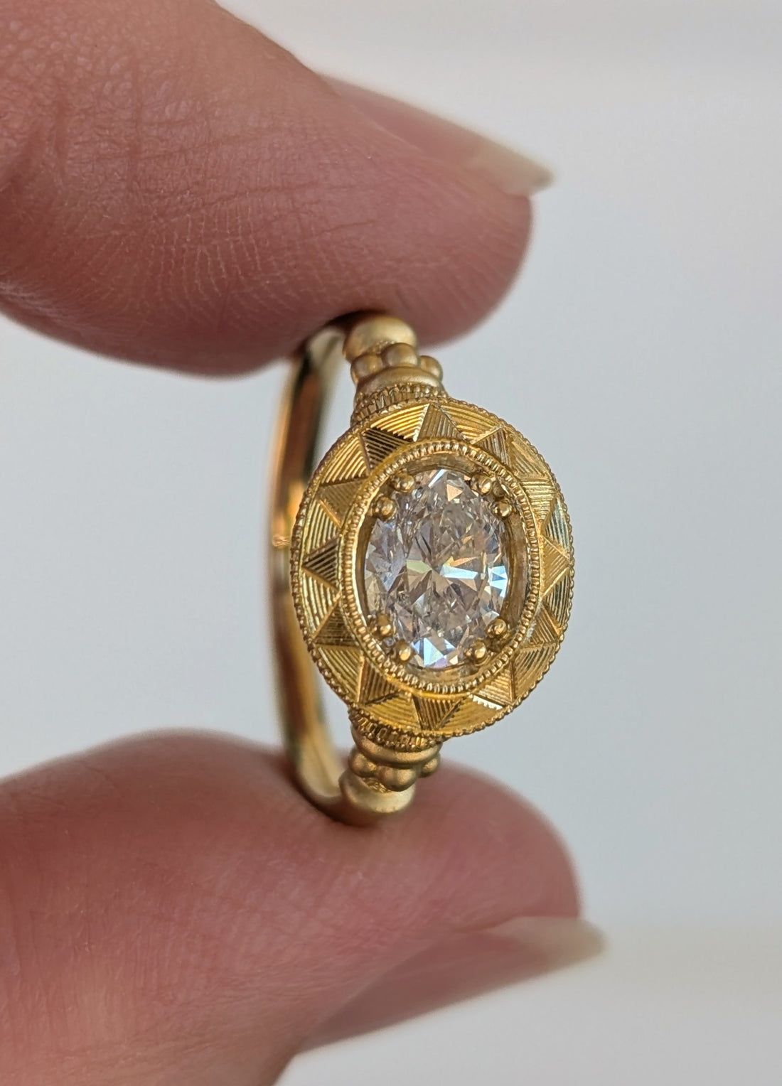 Lumiere Pedestal Solitaire - 0.76CT Oval Diamond