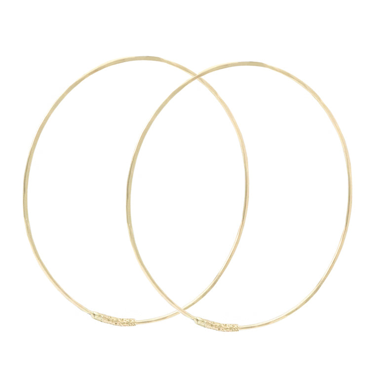 Large Featherweight Hoops in 14k gold by Erin Cuff Jewelry.