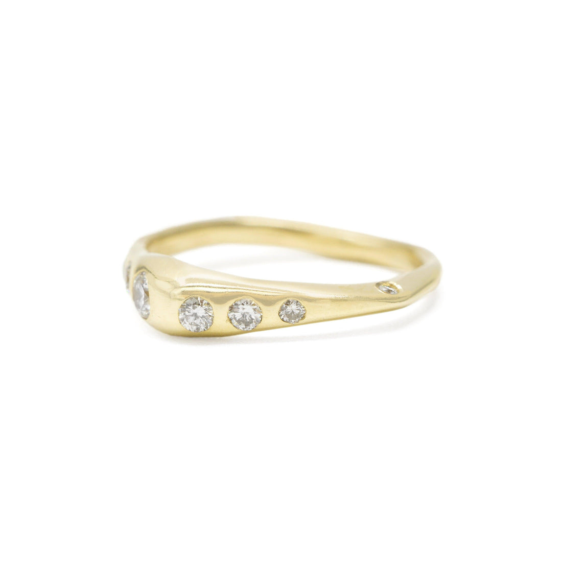 Hidden Diamond Astra Band in 14k yellow gold with diamond accents by Erin Cuff Jewelry.