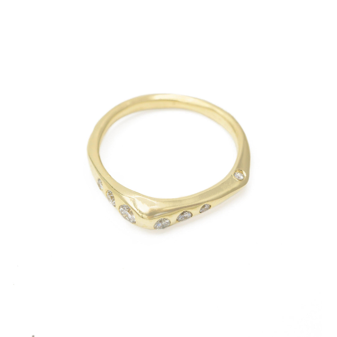 Hidden Diamond Astra Band in 14k yellow gold with diamond accents by Erin Cuff Jewelry.